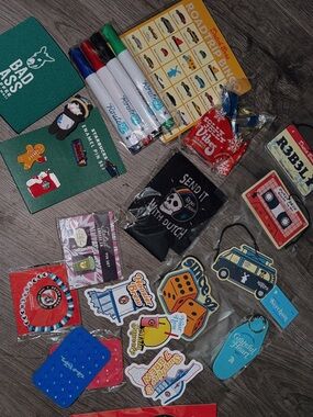 Dutch Bros Sticker and Pin Grab Bag with Teal, Blue, Red, Yellow, Black Accents